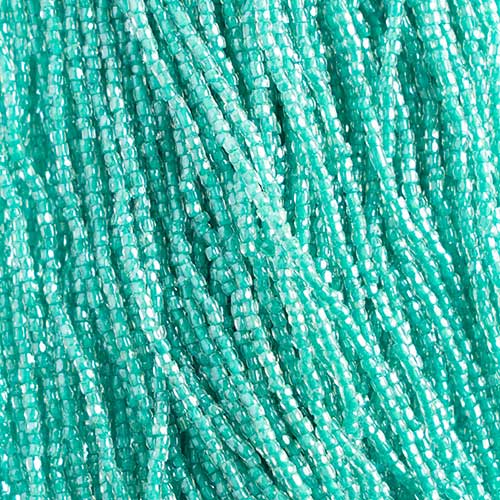 Czech - 10/0 - 3-cut Seed Beads - Crystal/Green (pkg strung)