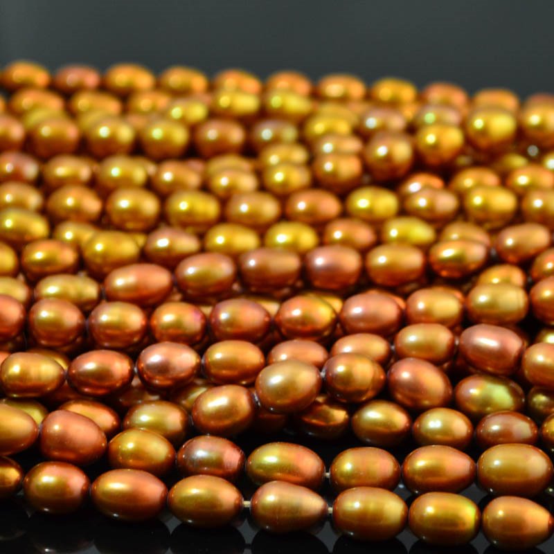 Freshwater Pearls - 7x9mm Oval Pearl - Gold (strand)