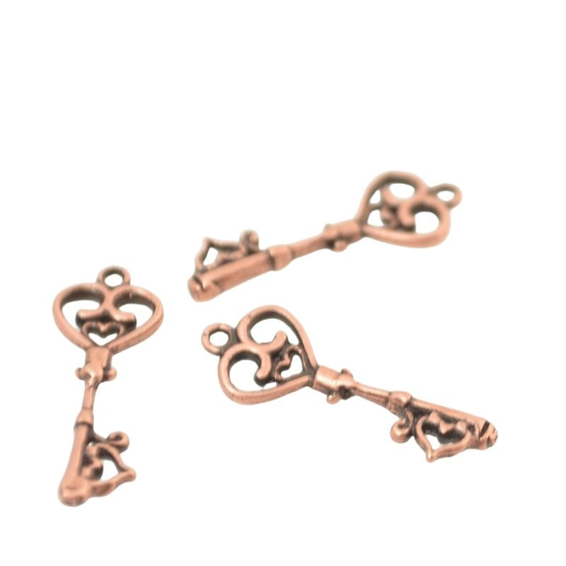 Dainty Key Charm Antiqued Copper Each