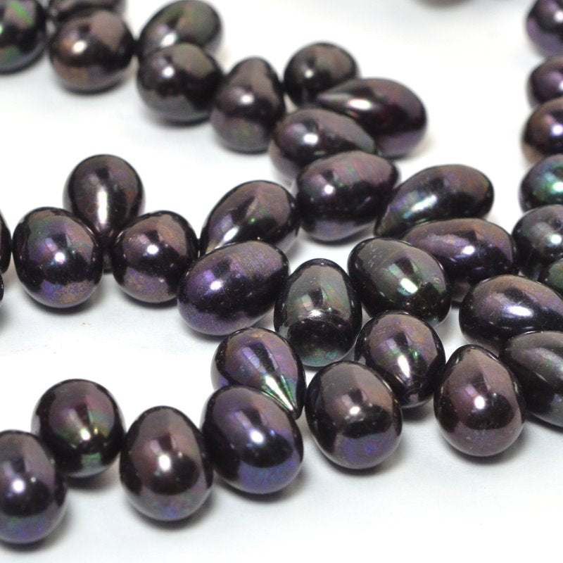 Freshwater Pearls - 9x7mm Bullet Pearl - Dark Plum Lustre Pearl (strand)