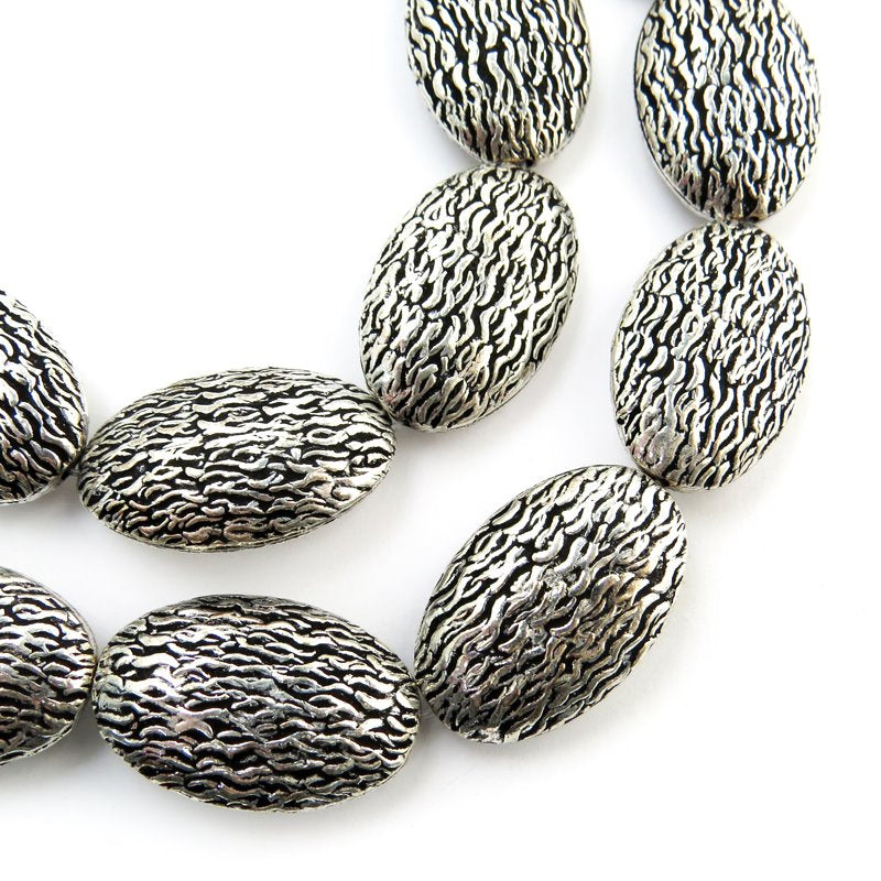Metal Bead - 18x27mm Deep Texture Ovals - Antiqued Silver (strand)