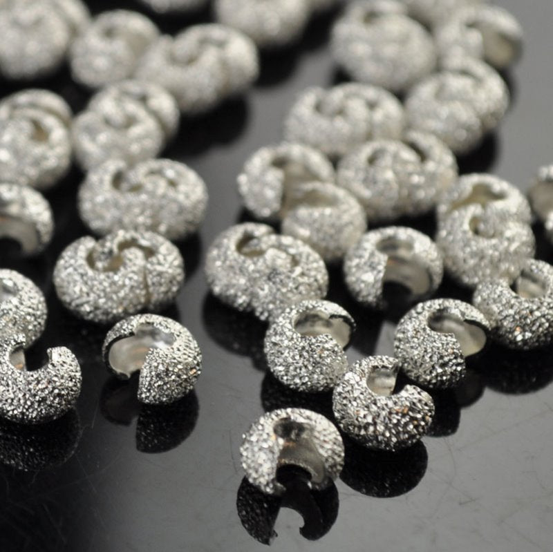 Crimp Bead Covers Stardust - 4mm - Bright Silver (100)