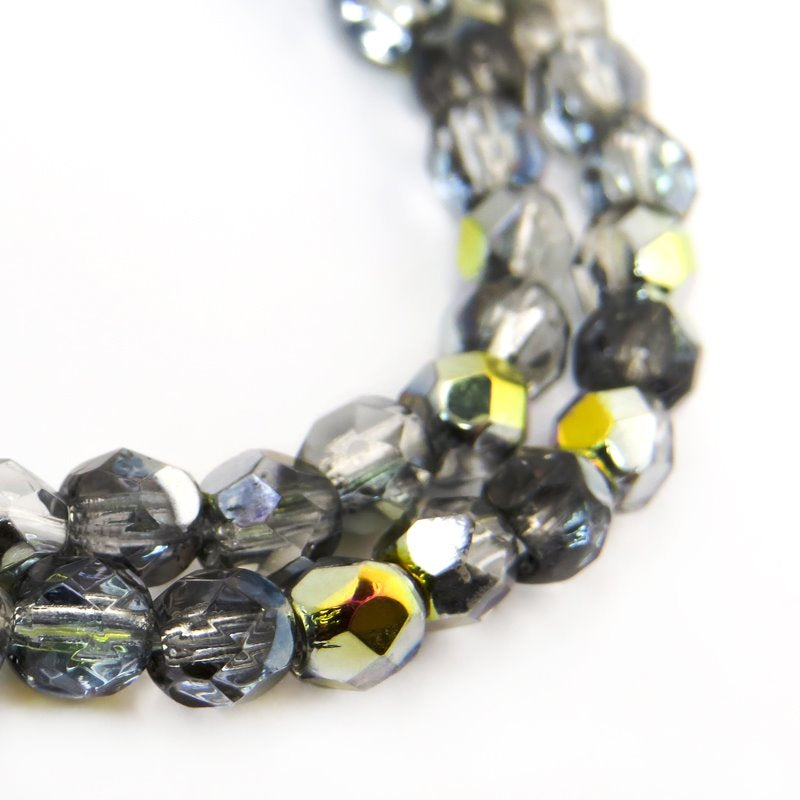 Fire Polish Faceted Round - 4mm - Crystal Marea (strand)