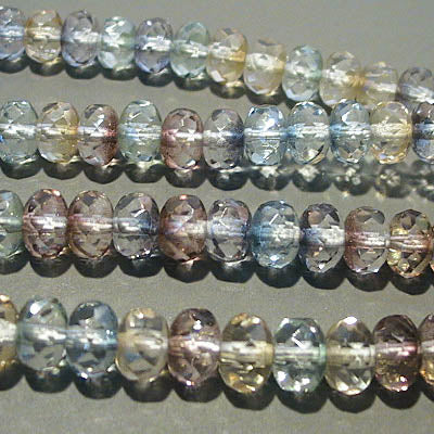 Fire Polish - 7mm - Faceted Donut - Pastel Lustre (strand 30)