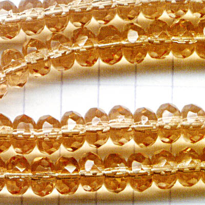 Fire Polish - 7mm - Faceted Donut - Rusty Rose (Strand 25)