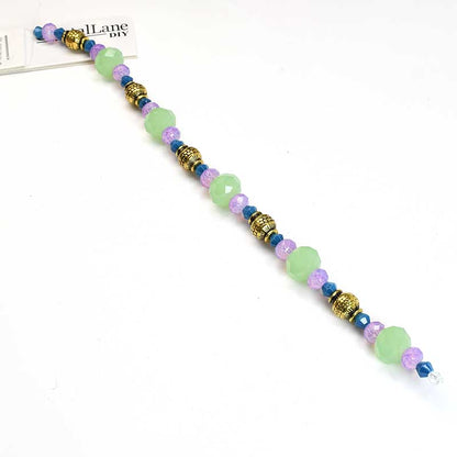 Crystal Lane Designer Strands - Faceted Rondelles and Metal Shape - Jade and Ale