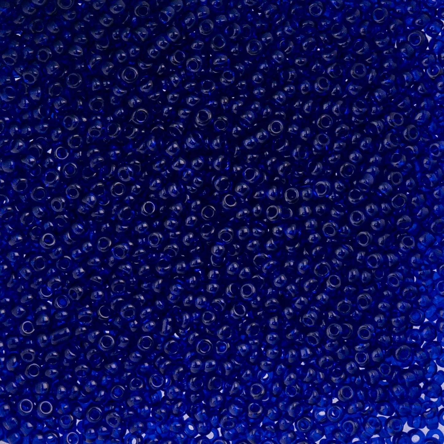 Czech Seed Beads - 10/0 - Natural Transparent Royal Blue (22g)