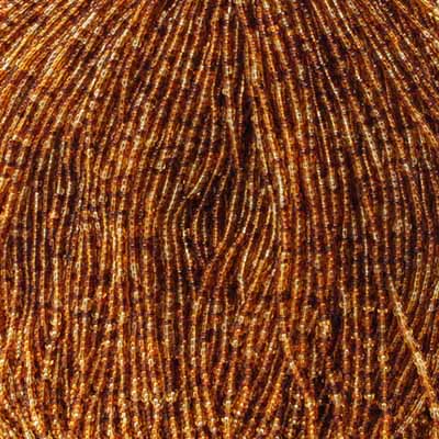 Czech - 11/0 Seed bead - Transparent Topaz Mix (500g Strung)