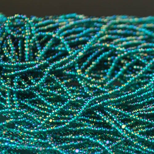 Czech Cut Seedbeads - 13/0 - Transparent Dark Green AB (hank)