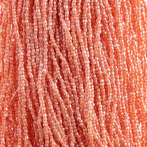 Czech - 10/0 - 3-cut Seed Beads - Crystal/Orange (pkg strung)