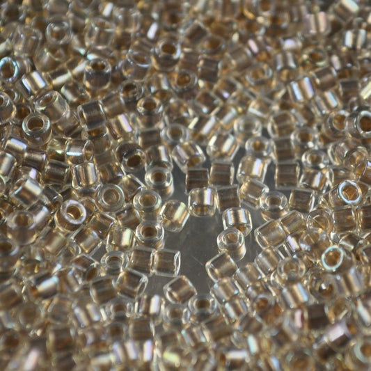 Delica Beads 10/0 - dbm0064b - Crystal Ivory Lined AB Dyed 50g