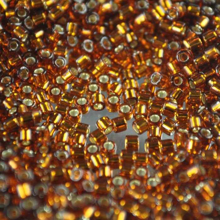 Delica Beads 10/0 - dbm0144b - Silver Lined Dark Topaz 50g