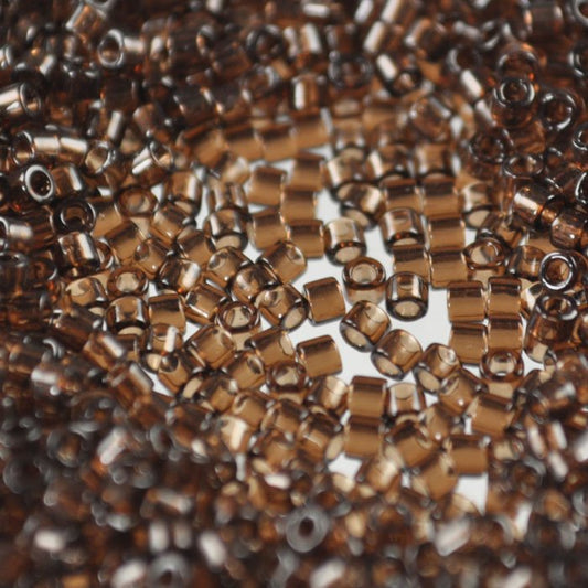 Delica 10/0 Beads - dbm0715 - Transparent Root Beer 7.2g