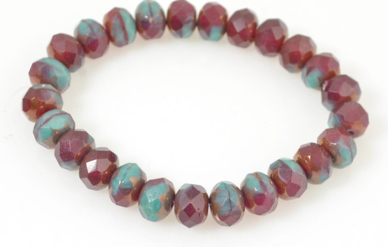 Fire Polish - 9x6mm - Faceted Donut - Turkish Adventure (strand 25)