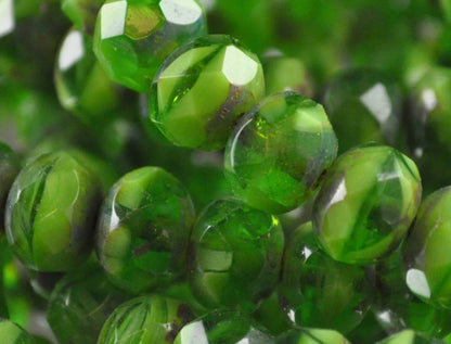 Fire Polish - 8x6mm - Faceted Donut - High Times (strand 25)