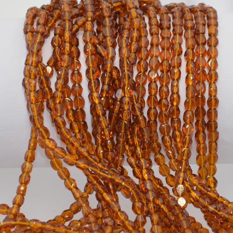 Fire Polish - 4mm - Faceted Windows - Dark Topaz (strand 50)