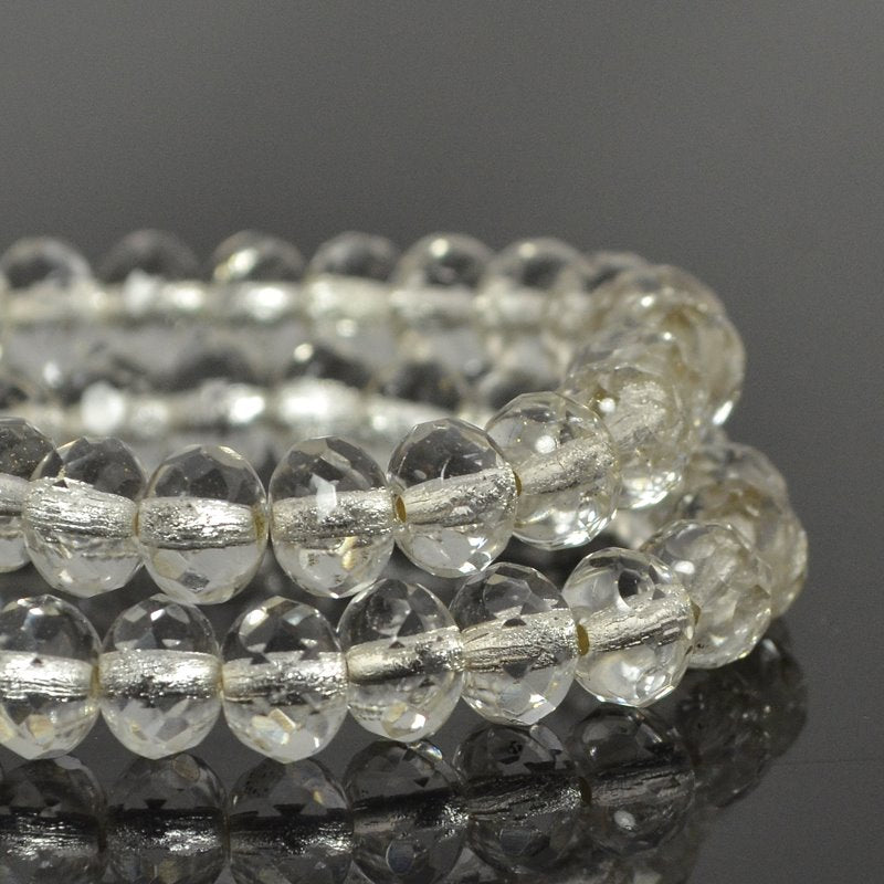 Fire Polish - 7x5mm - Faceted Donut Rondelle - Silver Lined Crystal (strand 25)