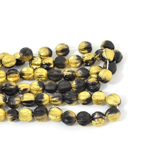 Czech Glass - 6 mm Melon Cut Round - Etched Jet Gold (strand 25)