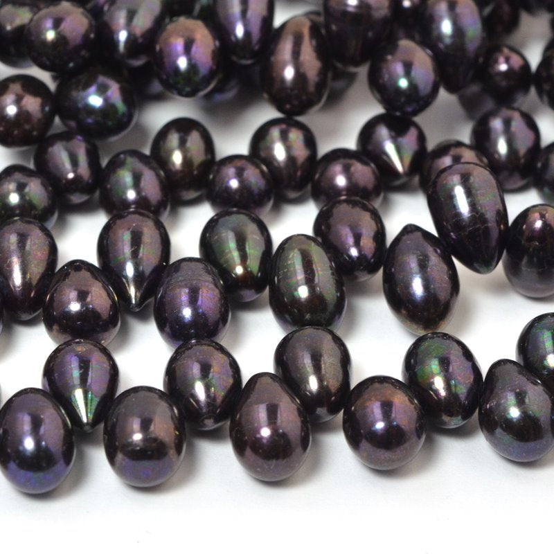 Freshwater Pearls - 9x7mm Bullet Pearl - Dark Plum Lustre Pearl (strand)