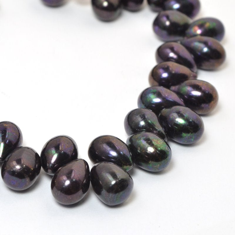 Freshwater Pearls - 9x7mm Bullet Pearl - Dark Plum Lustre Pearl (strand)