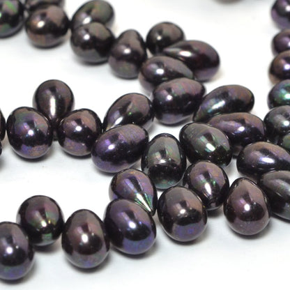 Freshwater Pearls - 9x7mm Bullet Pearl - Dark Plum Lustre Pearl (strand)