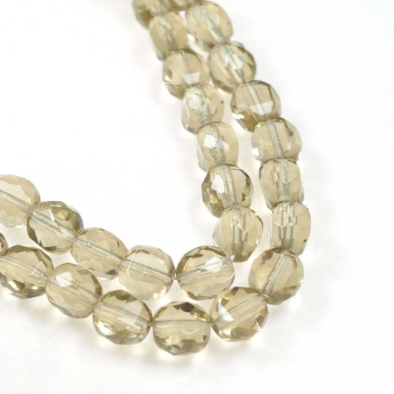 Czech Glass - 8mm TwoWay Fancy Faceted Oval - Light Smokey Topaz (strand 25)