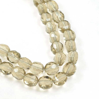 Czech Glass - 8mm TwoWay Fancy Faceted Oval - Light Smokey Topaz (strand 25)
