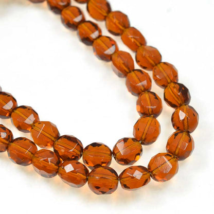 Czech Glass - 8mm TwoWay Fancy Faceted Oval - Dark Topaz (strand 25)