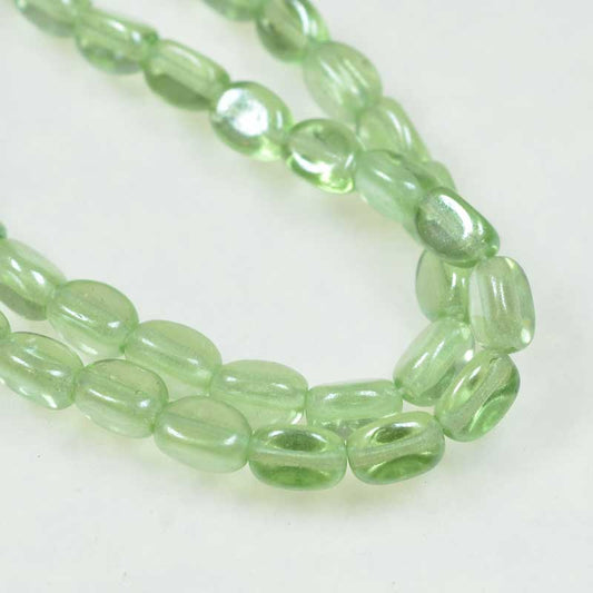 Czech Glass Edged Oval - 7mm - Peridot Lustre (strand 50)