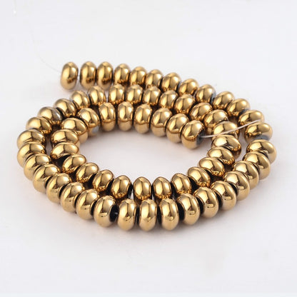 GoldPl Hematite   10mm Donut 15.5in