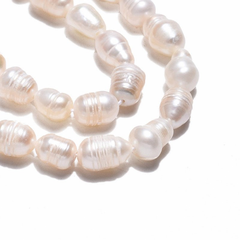 Freshwater Pearls - 7mm - Irregular Oval - White (strand)