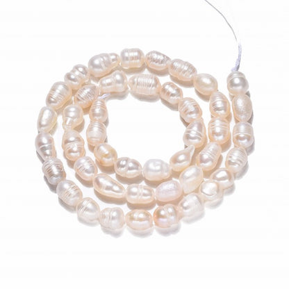 Freshwater Pearls - 7mm - Irregular Oval - White (strand)