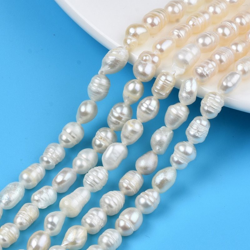 Freshwater Pearls - 7mm - Irregular Oval - White (strand)