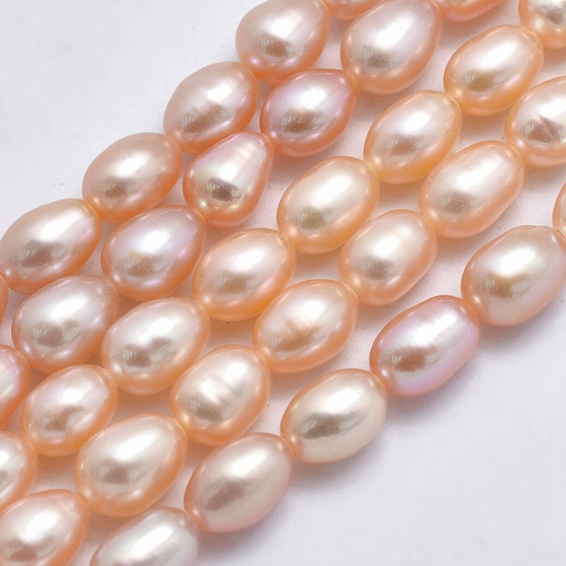 Natural Cultured Freshwater Pearls - 5-6mm - Rice - Light Peach (strand)