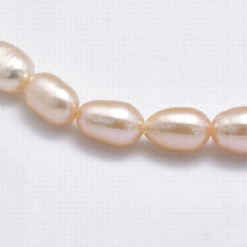 Natural Cultured Freshwater Pearls - 5-6mm - Rice - Light Peach (strand)
