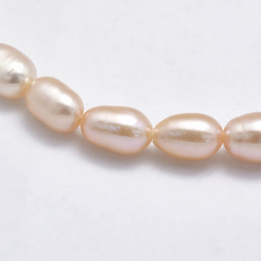 Natural Cultured Freshwater Pearls - 5-6mm - Rice - Light Peach (strand)