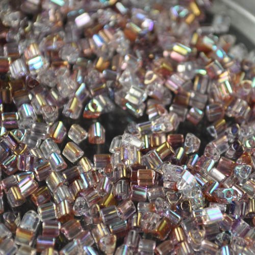 Toho Triangles - 11/0 - Hybrid Dual Lustred Gold / Amethyst AB (5 grams)